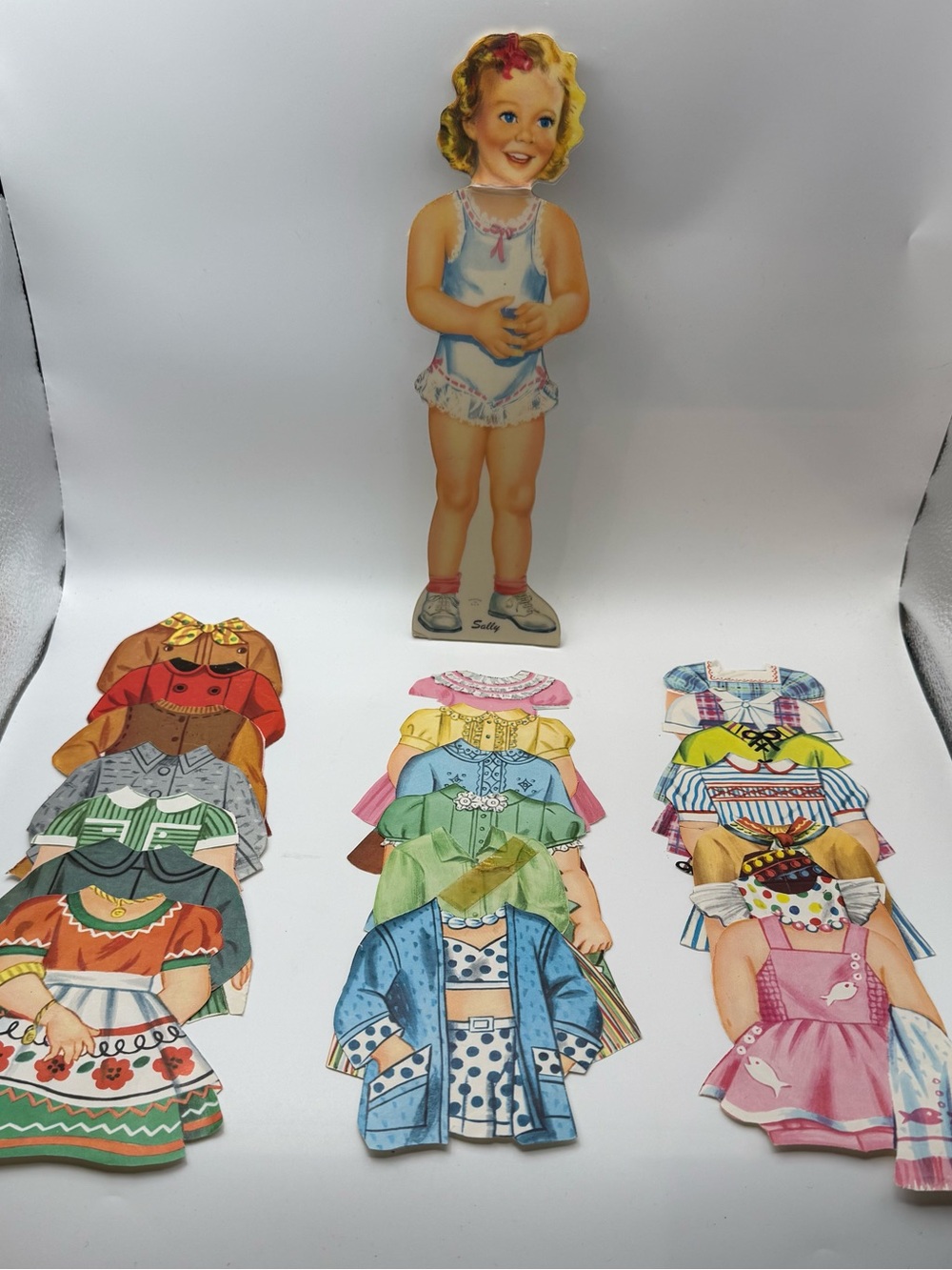 Vtg Mid Century Sally Paper
Doll Set - Includes 1 Doll & 20
Wardrobe Pieces Cut